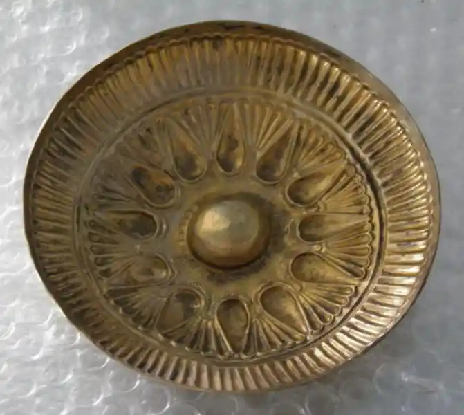 A solar disc, dish bowl with sun rays